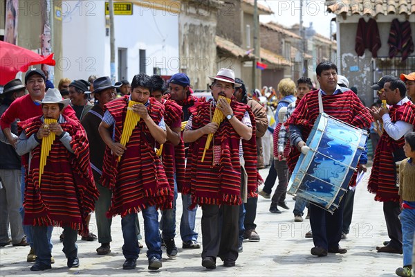 Music group in Ponchos with Siku