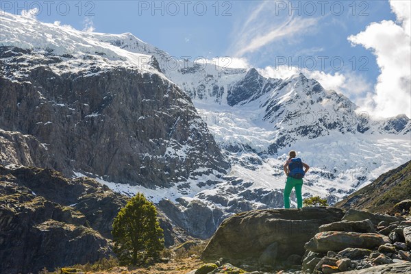 Hiker standing on rocks