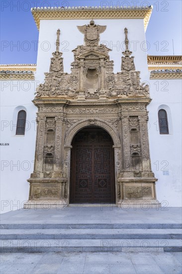 Plateresque portal with coat of arms Emperor Charles V