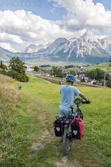 Cyclist on bike tour with mountain bike