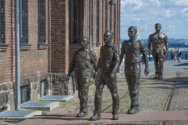 Sculptures of shipyard workers by artist Hans Pauli Olsen