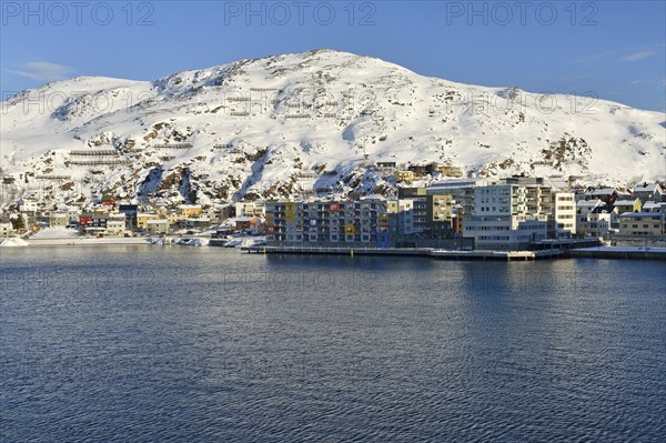 Residential building directly on the waterfront of a bay