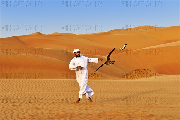 Falconer in the desert luxury hotel Anantara Qasr Al Sarab