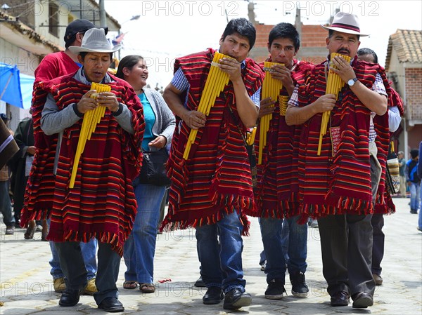 Music group in Ponchos with Siku