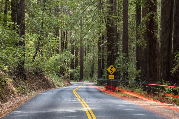 Curvy road with light guardrail