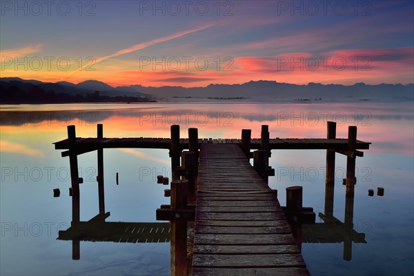 Wooden foodbridge at the Lake Pfaffikersee at dawn