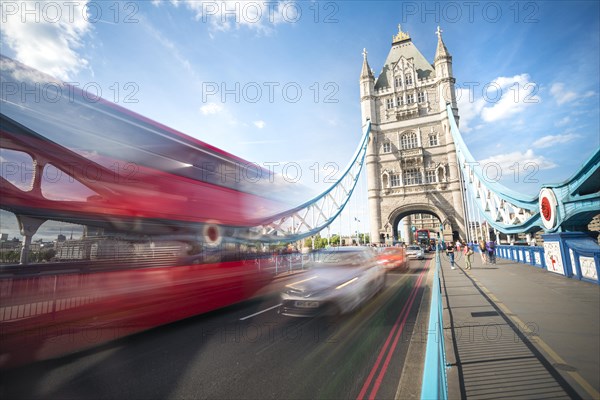 Red double-decker bus on the Tower Bridge