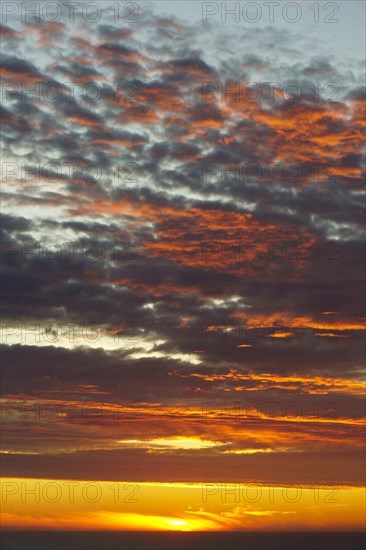 Shining sky over the Pacific Ocean at sunset