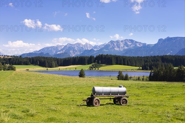 Water tank in meadow