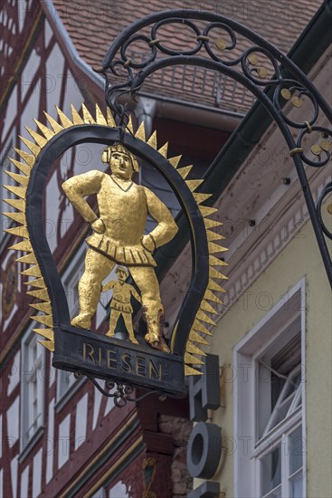 Hanging shop sign of the Gasthof Zum Riesen