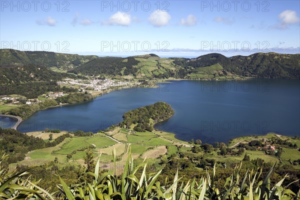 View from Miradouro do Cerrado das Freiras into the volcanic crater Caldera Sete Cidades with the crater lake Lago Azul