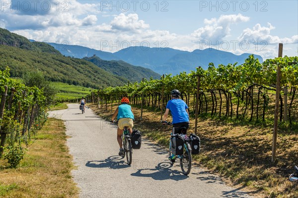 Two cyclists with mountain bike