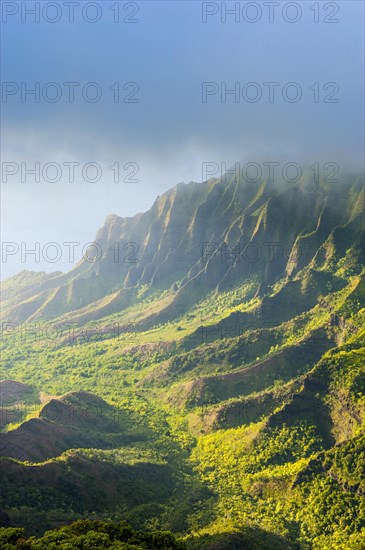 Napali coast with green mountains seen from the Kalalau lookout