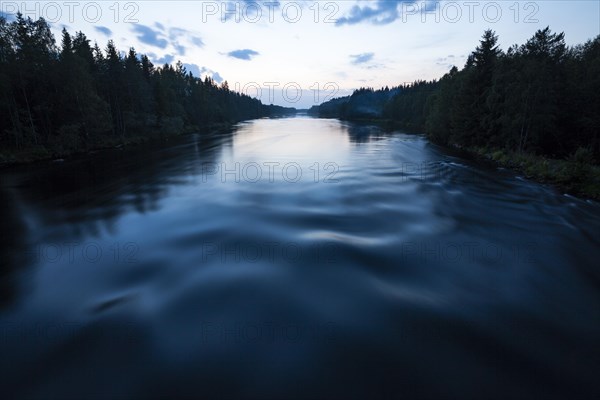 River in summer at midnight