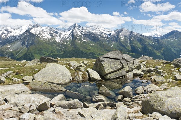 Clear water on rocks in the mountains