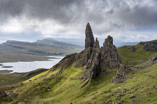 Rock formation Old Man of Storr with cloudy sky