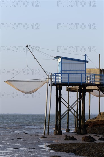 Traditional fishing huts built on stilts on the Gironde