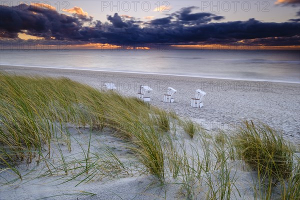 Beach chairs at the west beach of Hornum in the evening light