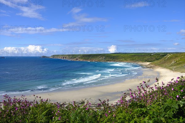 Wide sandy beach with waves