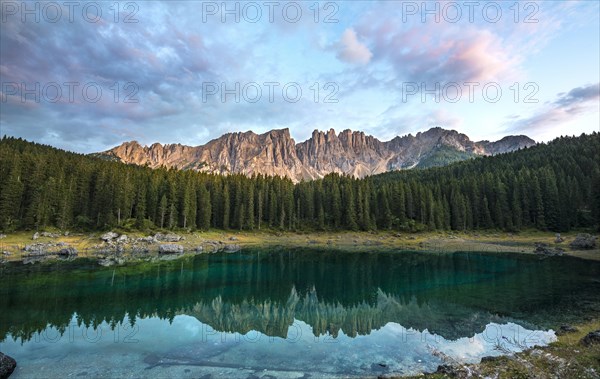 Latemar Group reflected in the Lake of Carezza