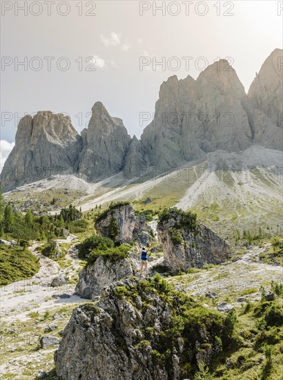 Hiker standing on rocks