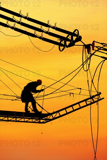 High-voltage engineer at work