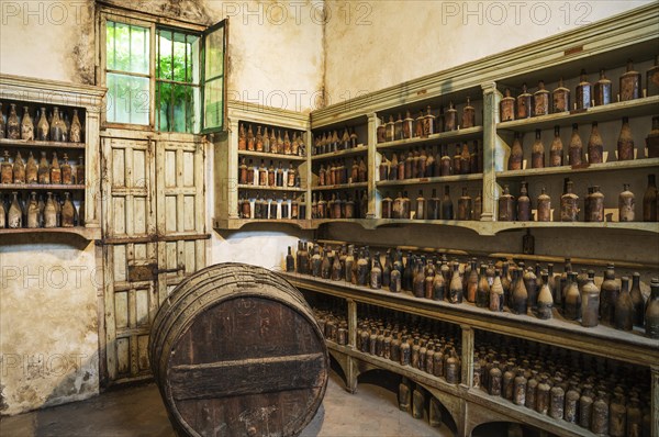 Showroom with old dust covered sherry bottles