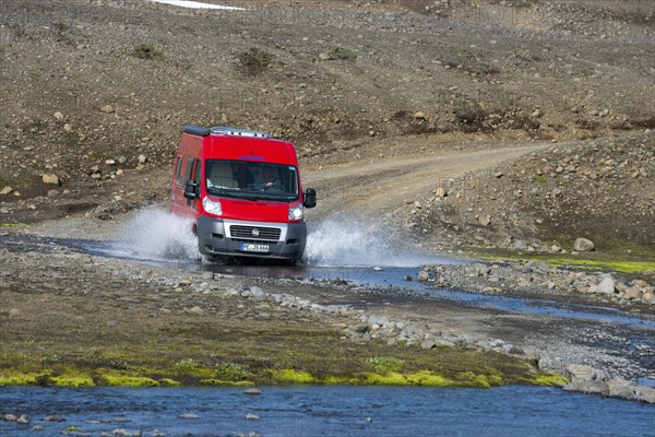 Caravan crossing river