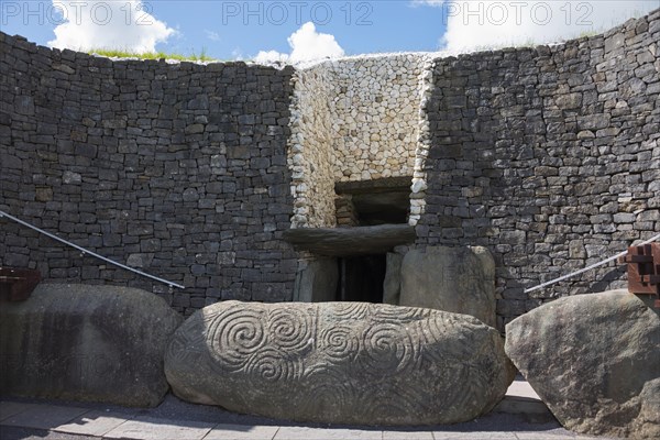 Carved stone block at entrance to grave chamber