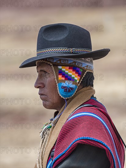 Indigenous man in typical national clothing with typical hat