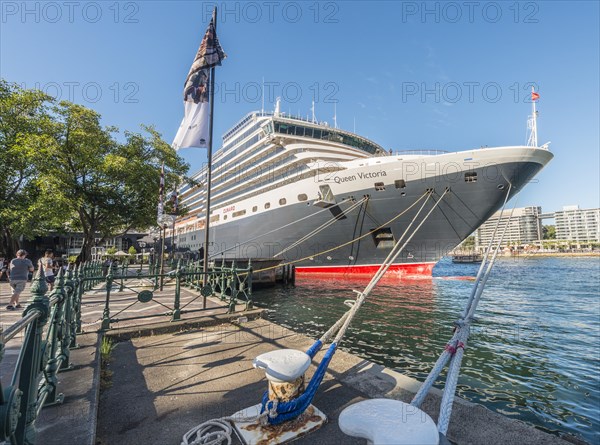 Cruise ship Queen Victoria is docked in the harbor