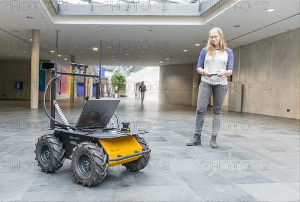 Student controls a robot car