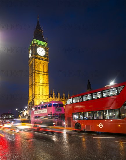 Red double-decker buses in front of Big Ben