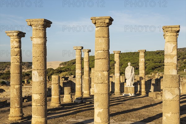 Ruins with statue of emperor Trajano