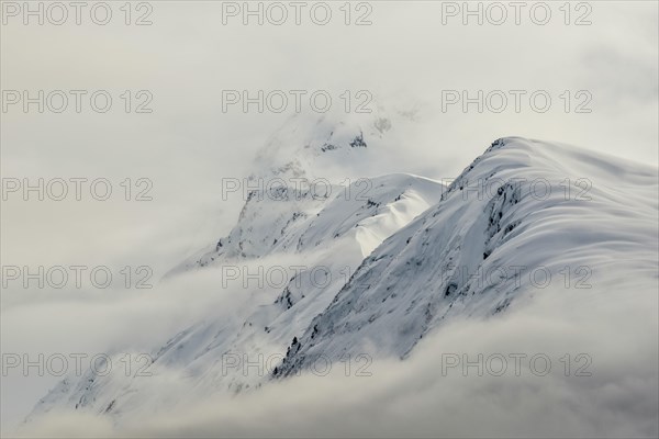 Mountains with snow and clouds