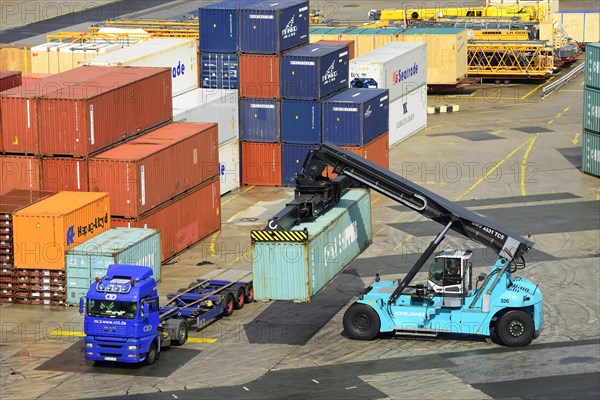 Container loaded onto a truck