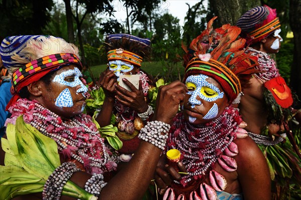 Natives paint themselves