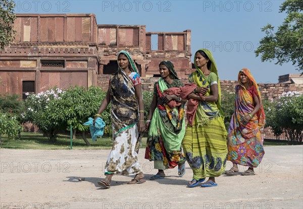 Indian women in traditional colorful sari dresses