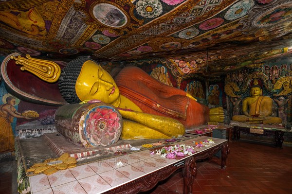 Reclining Buddha statue and painted ceilings