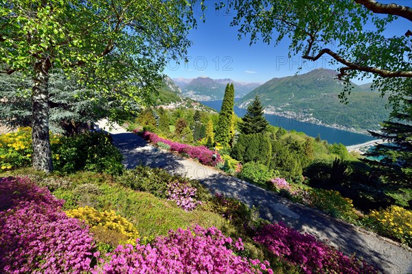 View from Parco San Grato on Lake Lugano with lake dam of Melide