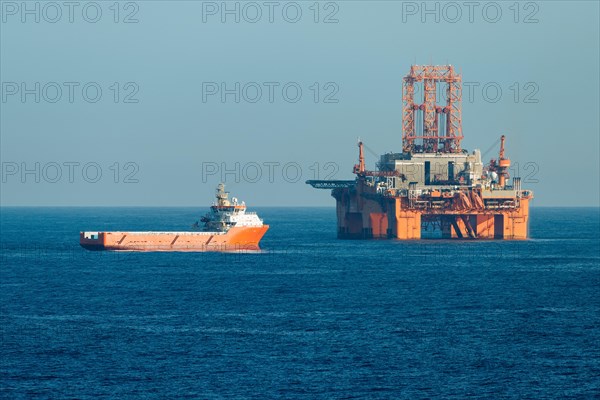 Supply vessel Normand Aurora next to West Phoenix oil rig