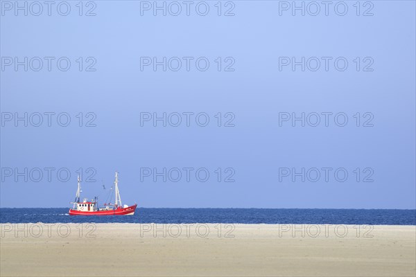 Red fishing boat in the North Sea