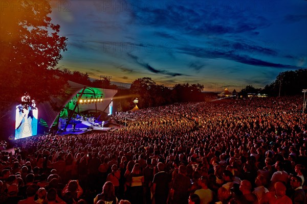 Audience at evening outdoor concert