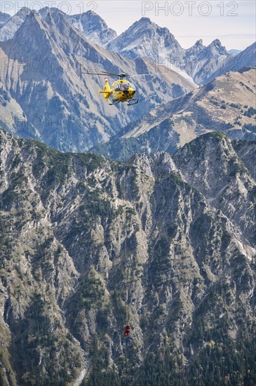 Mountain rescue by helicopter on the Fellhorn ridge