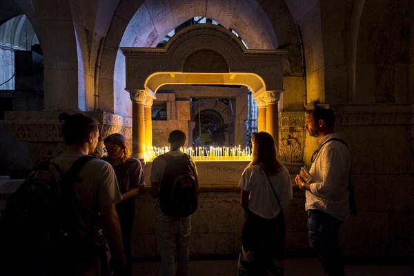 Shrine with sacrificial candles