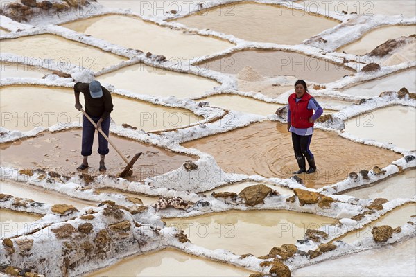 Workers in the salt mines of Maras