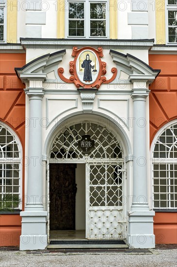 Monastery gate of the Benedictine abbey Holy Cross