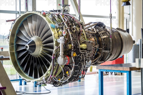 Engine's maintenance in huge industrial hall