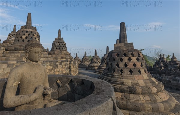 Uncovered Buddha statue at Borobudur Temple