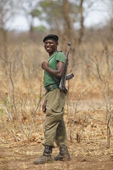 Gamekeeper with gun